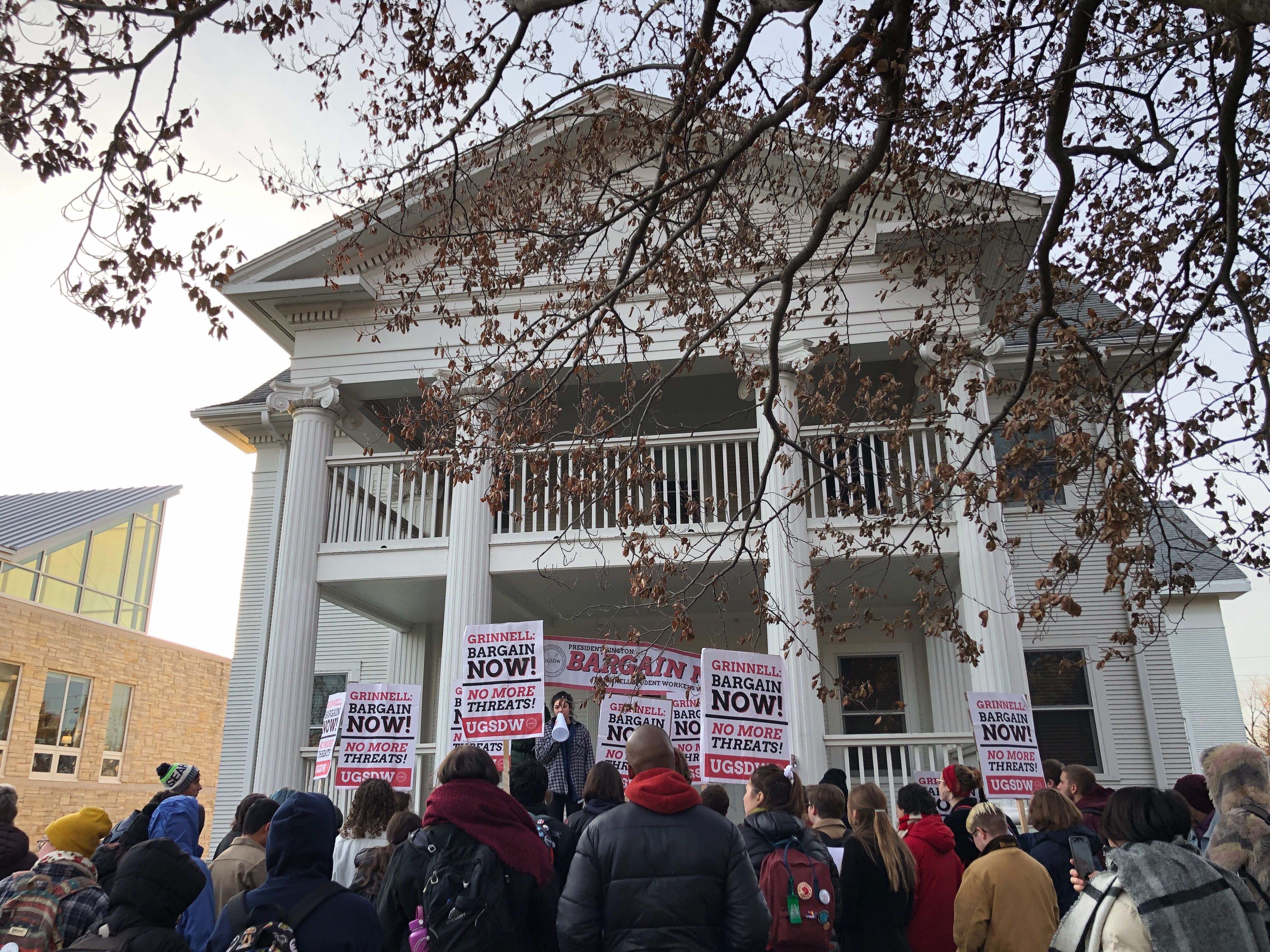 Student worker speaking at the Enough Waiting rally